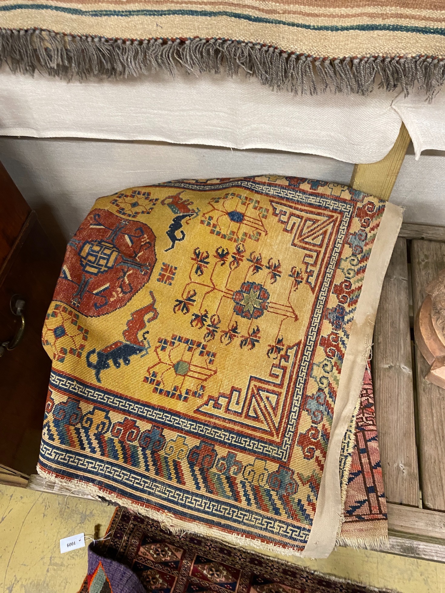 A Bokhara bagface rug, 122 x 69cm and four other rugs